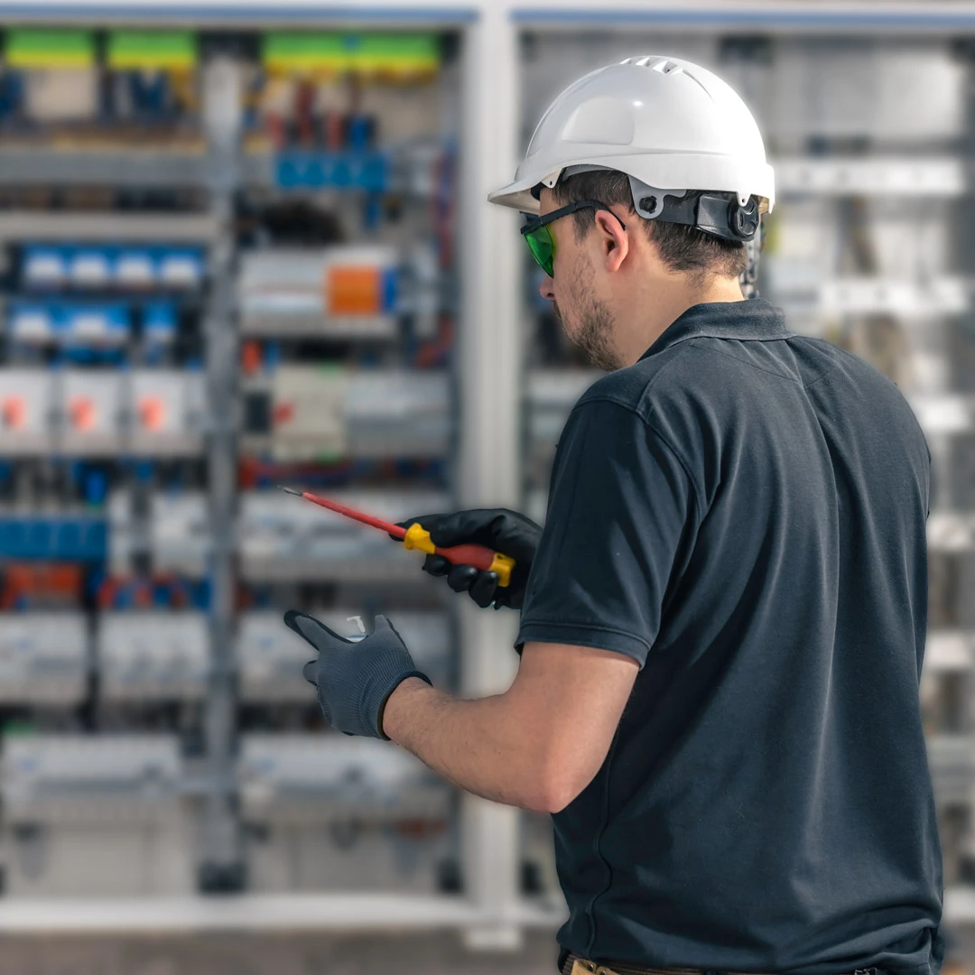 Kansas City commercial electrician repairing wiring