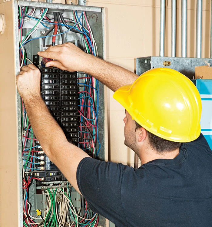 professional Olathe electrician repairing wiring
